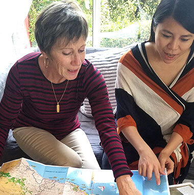 two women planning a visit